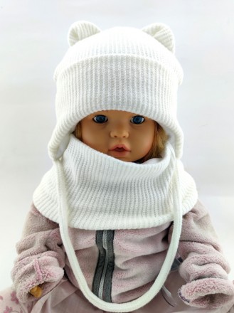 
Тепла в'язана дитяча шапка на зав'язках. Дуже приємна, м'яка і тепла тканина. Д. . фото 2