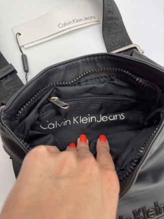 
 
 Сумка-планшетка Calvin Klein 9477
Материал : Водоотталкивающий текстиль
Разм. . фото 11