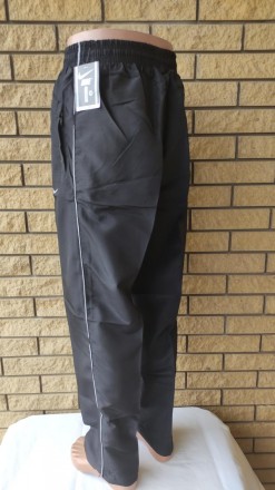 Спортивные штаны мужские реплика NIKE, плащевка, без подкладки.
Имеются 2 боковы. . фото 10