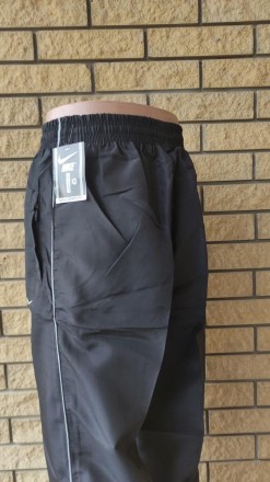 Спортивные штаны мужские реплика NIKE, плащевка, без подкладки.
Имеются 2 боковы. . фото 4