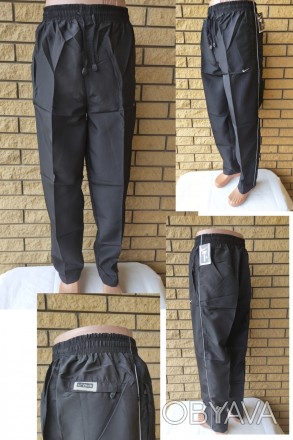 Спортивные штаны мужские реплика NIKE, плащевка, без подкладки.
Имеются 2 боковы. . фото 1