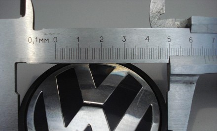 Ковпачки в диски (заглушки в диски) для легкосплавних дисків Volkswagen (VW).

. . фото 7