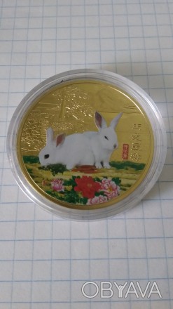 Сувенірна монета Рік кролика. Монета нова. Капсула не відкривалася. Розмір: 40*3. . фото 1