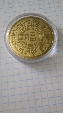 Колекційна монета Рік кролика. Монета нова. Розмір: 40*3 мм. Є срібний і золотий. . фото 3