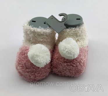 
Нарядная обувь для девочки. Сделаны из махры. Возраст примерно от 0 до 6 месяце. . фото 1