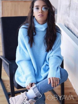 Женский длинный теплый свитер оверсайз из шерсти голубого цвета.
Свитер мягкий и. . фото 1
