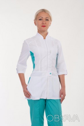Медицинский женский костюм на молнии
Размер: 42 - 56
Цвет: белый верх, голубой н. . фото 1