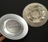 Оригинальные колпачки заглушки на литые диски Audi 8E0 601 165
8E0601165'
. . фото 3