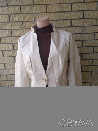 Куртка женская из экокожи HOLDLUCK изготовлена из искусственной кожи высокого ка. . фото 1