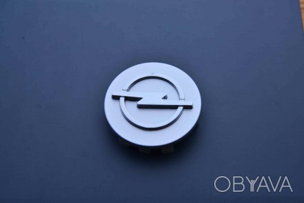 Колпачки заглушки на литые диски в диски Opel Опель (58,5/56/11) C-502A серебро
. . фото 1