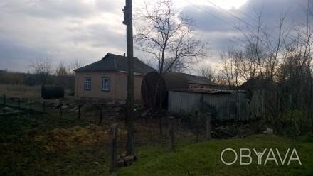 Продам теплий, кирпичний будинок в місті Новомиргород. Одна з центральних вулиць. . фото 1