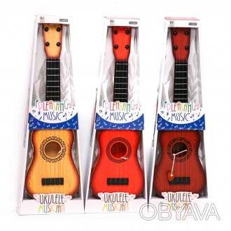 Гітара 77-01C р.59*20*7,5 см, гитара в подарочной коробке
​​​​​​​
Детская гитара. . фото 1