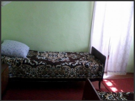 Сдам дом - 2 комнаты ( 3 кровати + диван + кресло) и кухня( газ, вода, посуда, х. Скадовск. фото 2