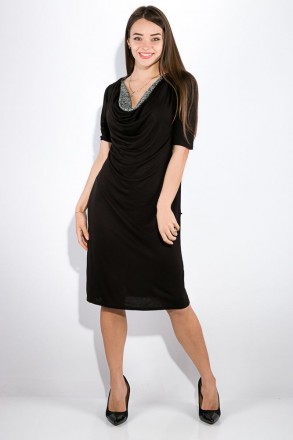 Стильное платье чёрного цвета с рукавами до локтя и оригинально оформленным деко. . фото 2