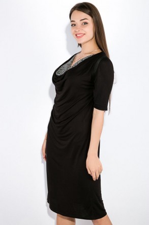 Стильное платье чёрного цвета с рукавами до локтя и оригинально оформленным деко. . фото 4