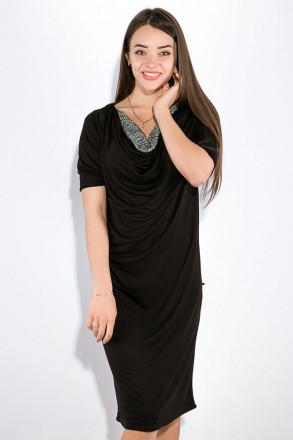 Стильное платье чёрного цвета с рукавами до локтя и оригинально оформленным деко. . фото 3