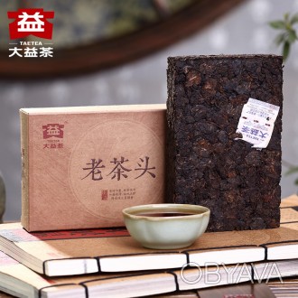 Чай Шу Пуэр Мэнхай Да И Лао Ча Тоу 1601 — это вид чая, имеющий форму золотого са. . фото 1