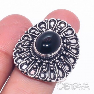 Предлагаем Вам купить красивое кольцо - черный оникс в серебре.
Размер 18,5-19.
. . фото 1