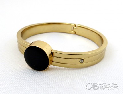 Модный браслет с декором в форме круга черного цвета. Цвет метала золотистый. Ди. . фото 1