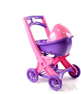 В этой коляске можно возить любимых кукол и зверей. Коляска розового цвета с фио. . фото 1