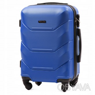 Малий пластиковий чемодан Wings 147 на 4 колесах
Надійність валіз кампанії WINGS. . фото 1