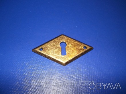 Ключевина для мебели
Цвет: бронза
Длина: 6см
Ширина там где ключ: 3,5см
Материал. . фото 1