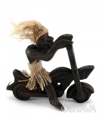Статуэтка из дерева, ручная работа, в виде фигурки папуаса едущего на мотоцикле.. . фото 1