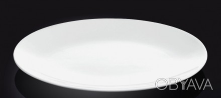Тарелка обеденная 230мм Wilmax
 Тарелка обеденная
 Объем: 230мм
 Количество таре. . фото 1