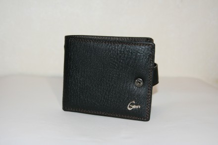 Мужское портмоне  - стильный бумажник, который сделан из кожи. Портмоне имеет ст. . фото 2