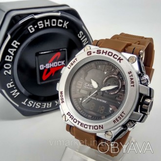 
Ударопрочные, влагозащищенные, спортивные наручные часы Casio G-Shock коричнево. . фото 1