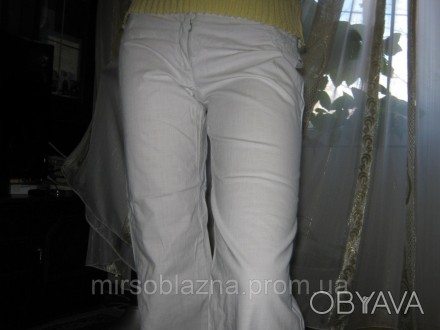  Летние женские брюки б/у, (тонкие джинсы), белого (молочного) цвета, однотонные. . фото 1