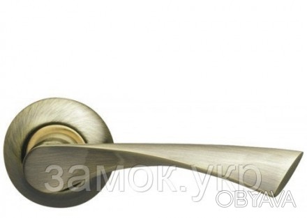 Ручка дверная на розетке Armadillo Corona LD23-1AB/SG-6 бронза/матовое золото
 
. . фото 1