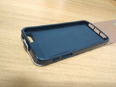 Флип чехол iPhone SE 5 5s книжка вниз by melko черный
Тип: Чехол-флип
Материал: . . фото 2